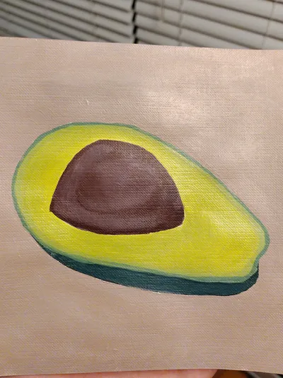 An avocado Kevin painted